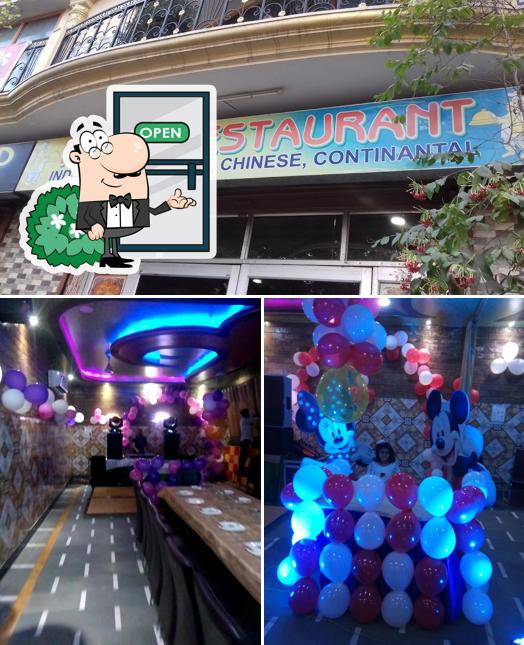 The photo of Parth Restaurant’s exterior and dining table