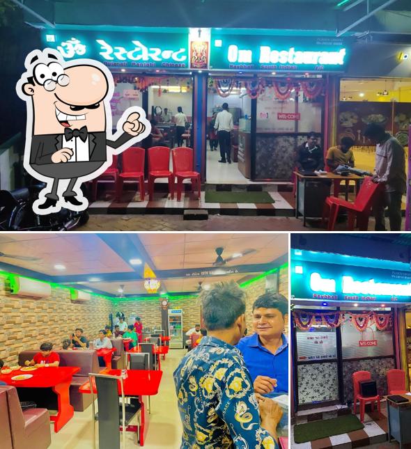 The interior of ॐ રેસ્ટોરન્ટ Om Restaurant - Best Restaurant in Mangrol, Family restaurant, Veg Restaurant in Mangrol