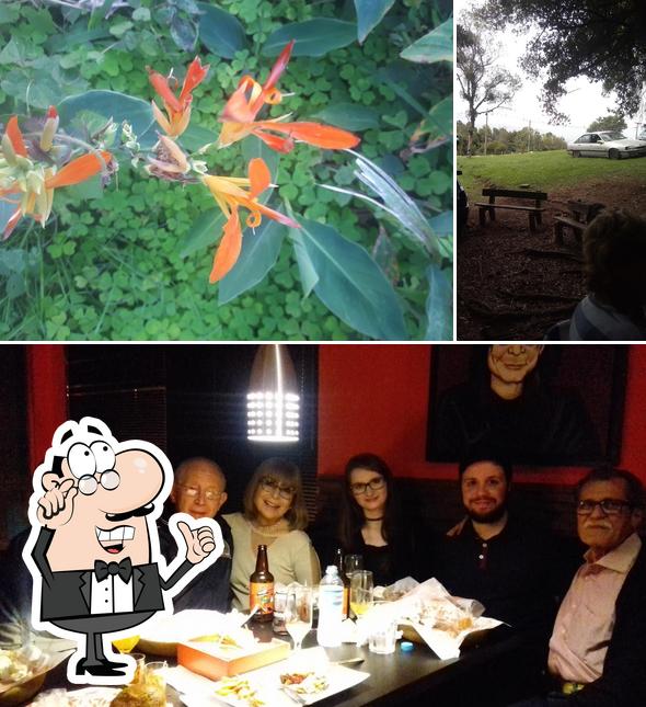 Confira a foto apresentando interior e peixe no Bar Das Antenas