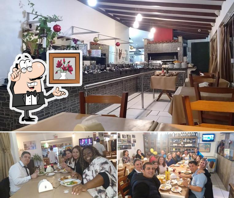 Sente em uma das mesas no Petiscaria Cabeçudas