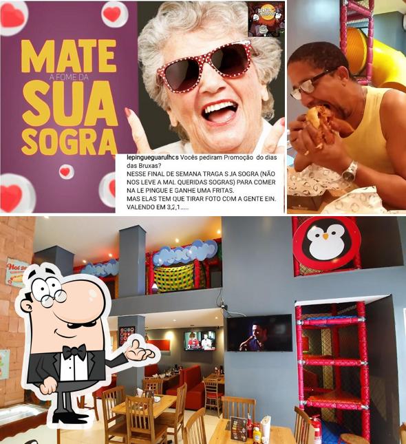 Sente em uma das mesas no Hamburgueria Le Pinguê Guarulhos