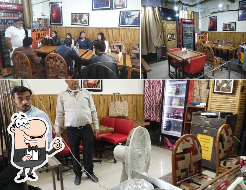Take a seat at one of the tables at Chopra Chicken - Chd. Veg & Non Veg