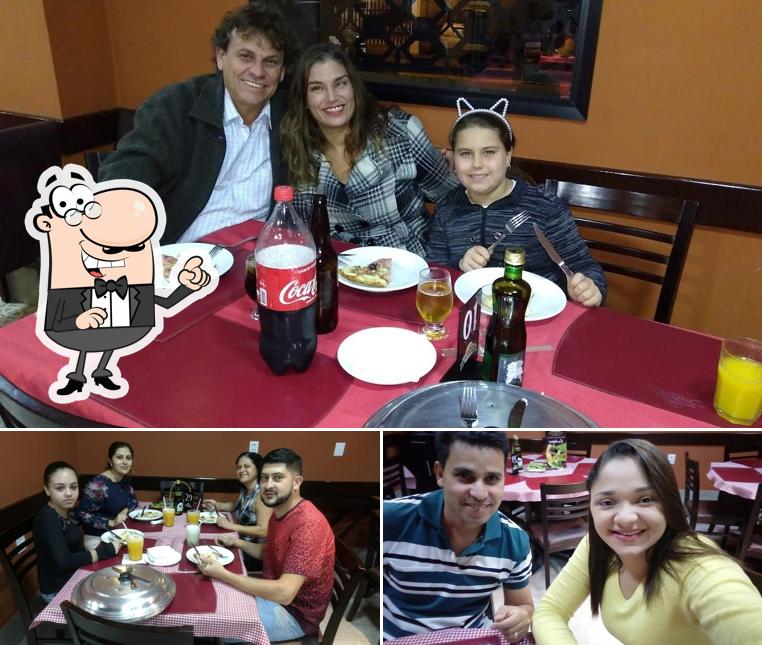 Veja imagens do interior do Pizzaria Monte Carlo