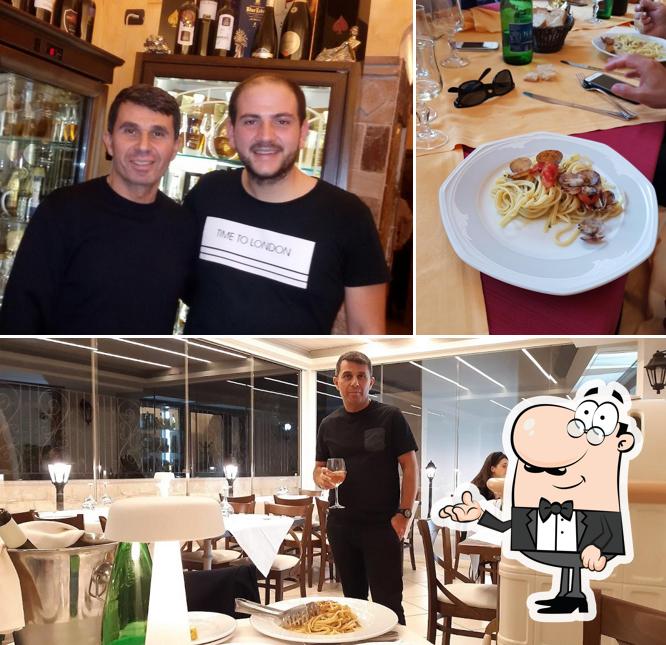 Questa è la foto che presenta la interni e bancone da bar di Ristorante il Cantuccio