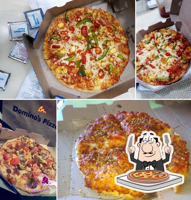 Pick pizza at Domino's Pizza Abrol Nagar, Nawanshahr