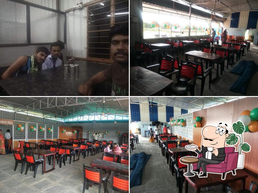 Take a seat at one of the tables at Lakshmi Dhaba - ಲಕ್ಷ್ಮಿ ಧಾಬಾ