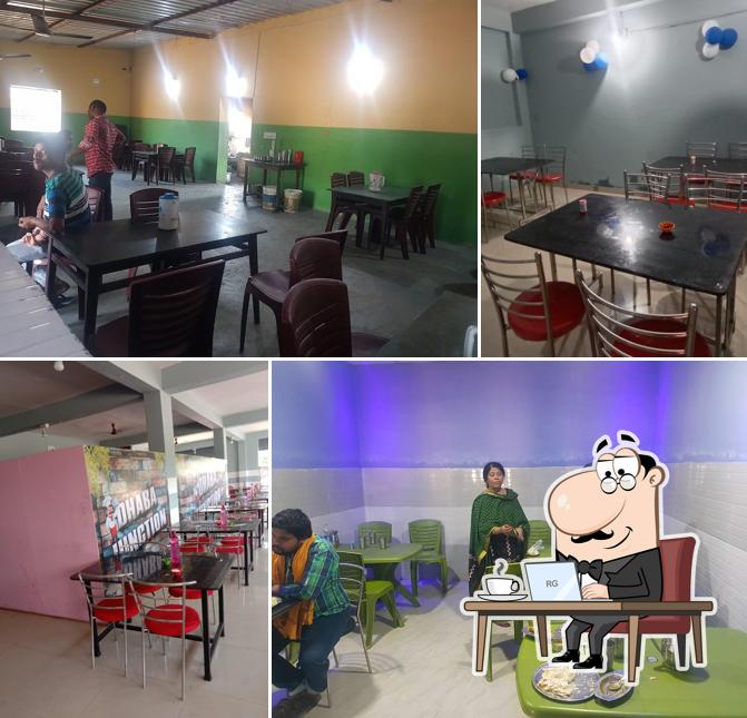 Take a seat at one of the tables at Highway Inn