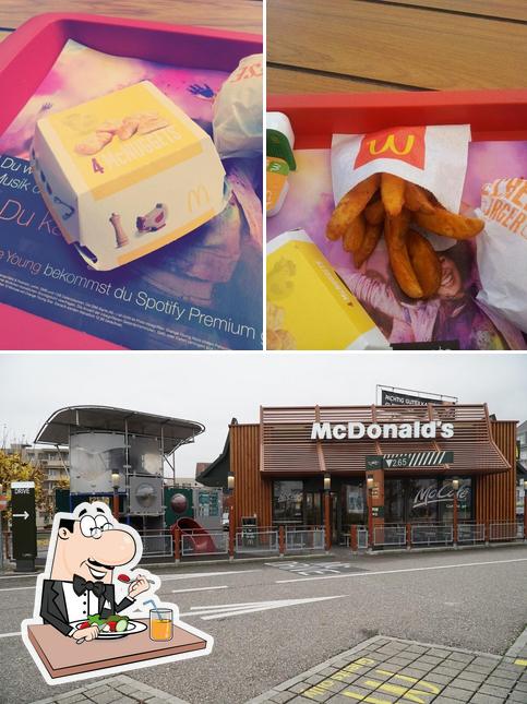 Guarda la immagine che presenta la cibo e interni di McDonald’s