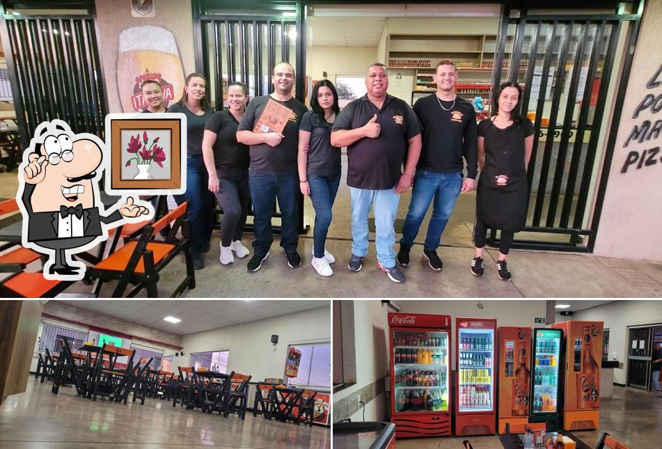 O interior do Marcelo Lanches Hamburgueria e Pizzaria