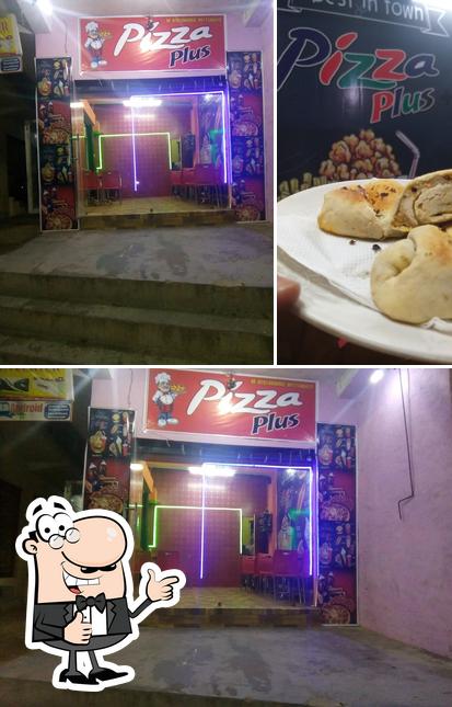 Look at the image of PIZZA PLUS +