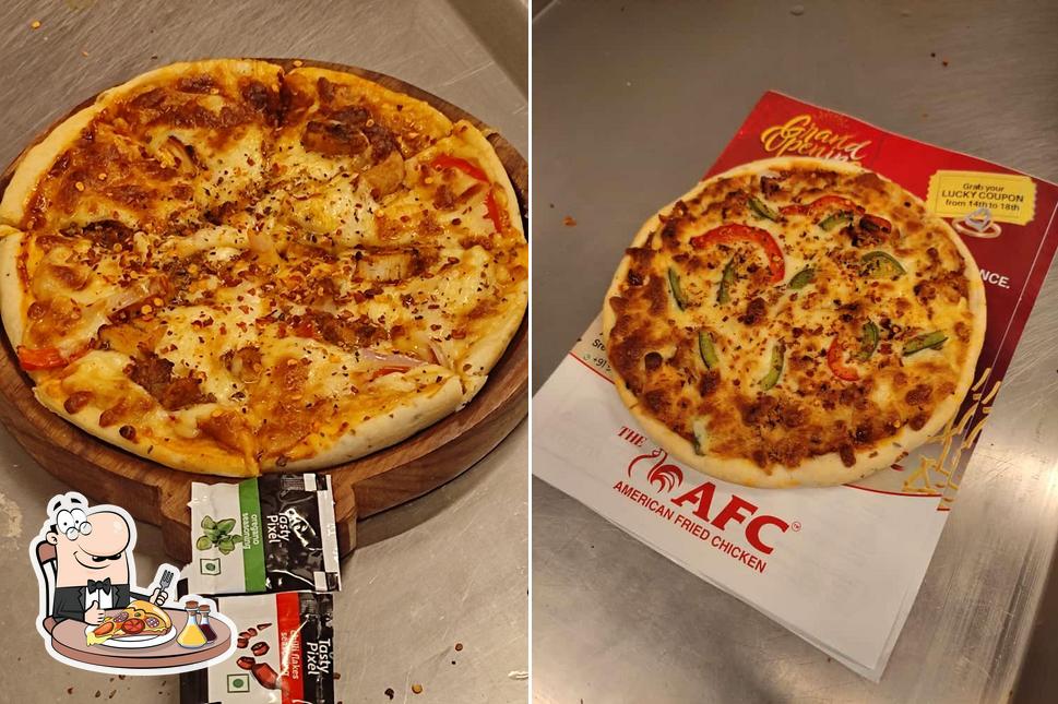 Try out pizza at AFC Mysore (American Fried Chicken Mysuru)
