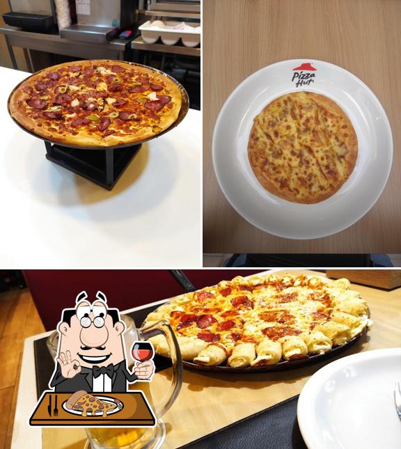No Pizza Hut PH Express Shopping Itaguaçu, você pode desfrutar de pizza