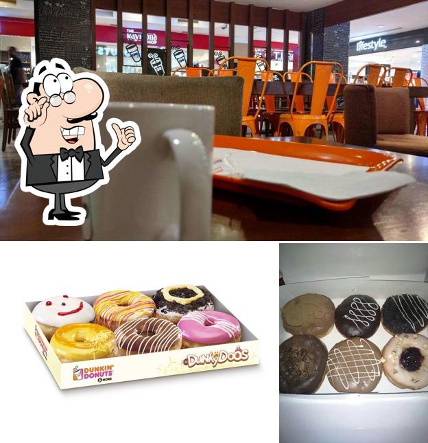 Take a seat at one of the tables at DUNKIN'