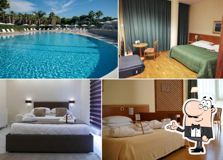 Siediti a un tavolo di TURSPORT HOTEL RESIDENCE