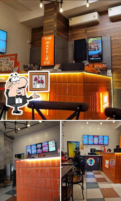 Take a seat at one of the tables at The Waffle Co. Alpha 1