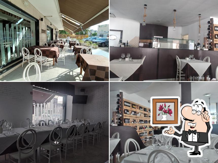 Dai un'occhiata agli interni di Osteria Sul Ponte