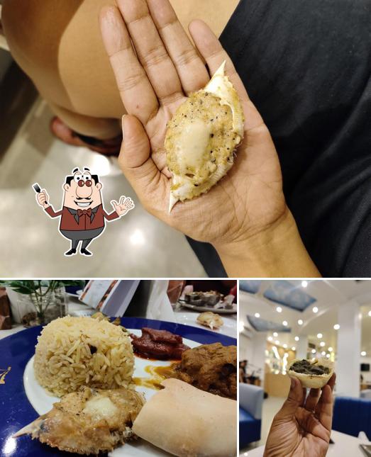 This is the image depicting food and interior at ARROZ - Kitchen & Bar