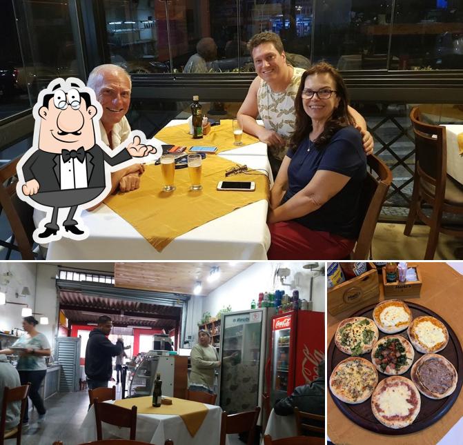 O interior do Marki's Restaurante, Pizzaria e Esfiharia