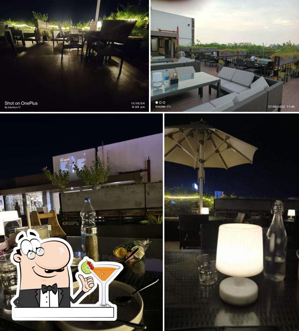 This is the image depicting drink and interior at Cocoa & Creme Rooftop Cafe