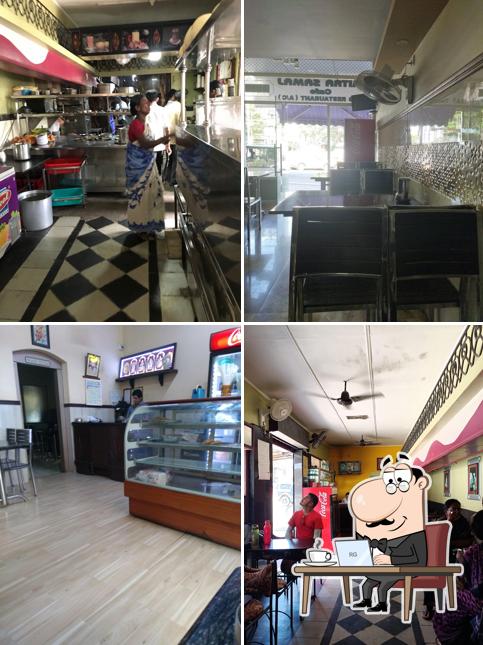 Take a seat at one of the tables at Mitra Samaj