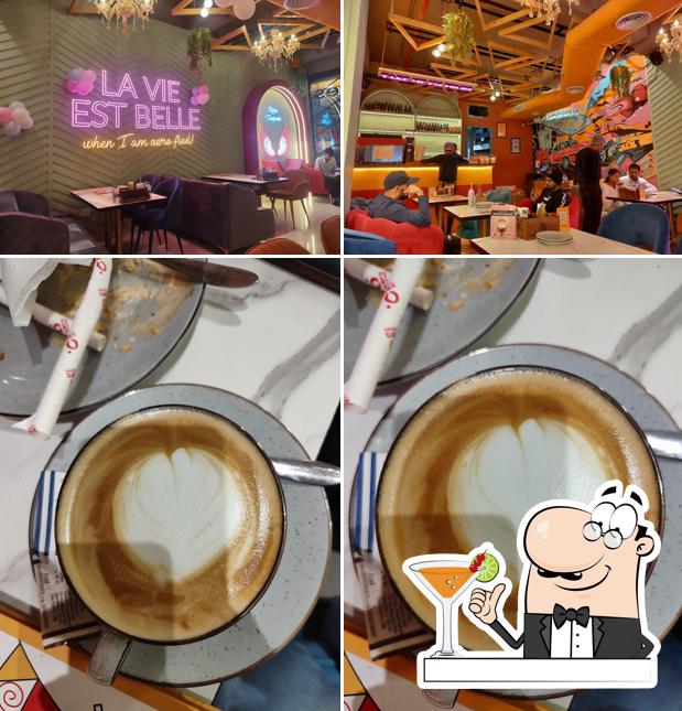 Take a look at the image depicting drink and interior at Xero Degrees