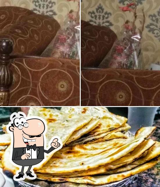 Take a look at the photo depicting interior and food at Aggarwal Sweets India