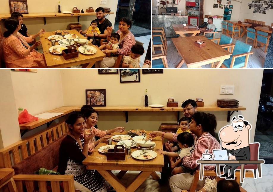 Check out the photo displaying interior and food at A Tavola Con Te -2 - Italian Woodfired Oven Pizza