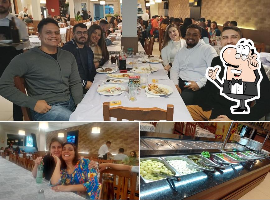 Entre diferentes coisas, interior e comida podem ser encontrados a Restaurante Pizzaria e Sushi Duevitta
