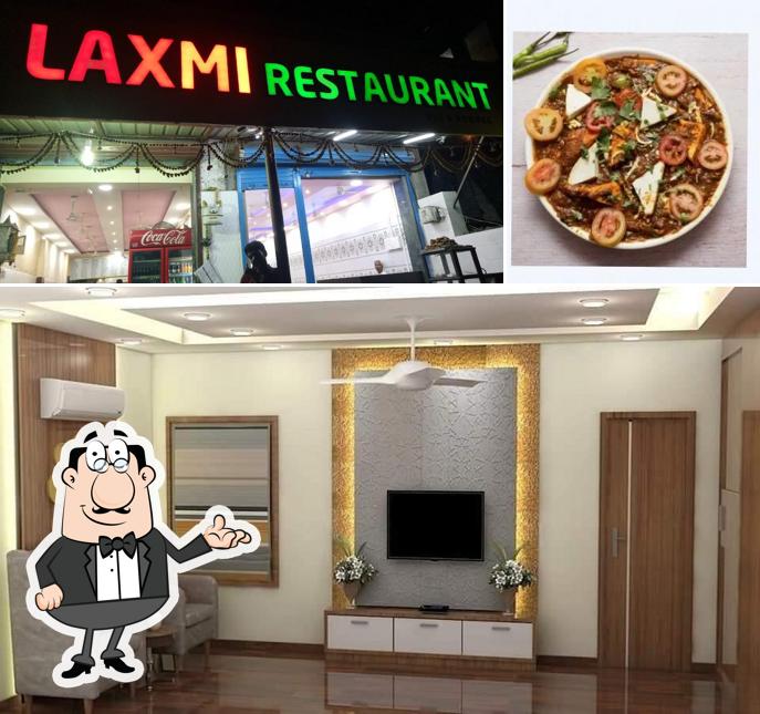 This is the photo depicting interior and food at - Best Indian Restaurant in Vapi