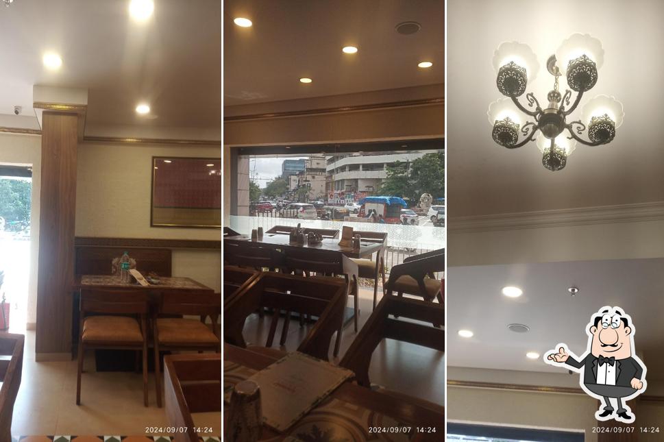 Take a seat at one of the tables at Kamats Legacy Vashi