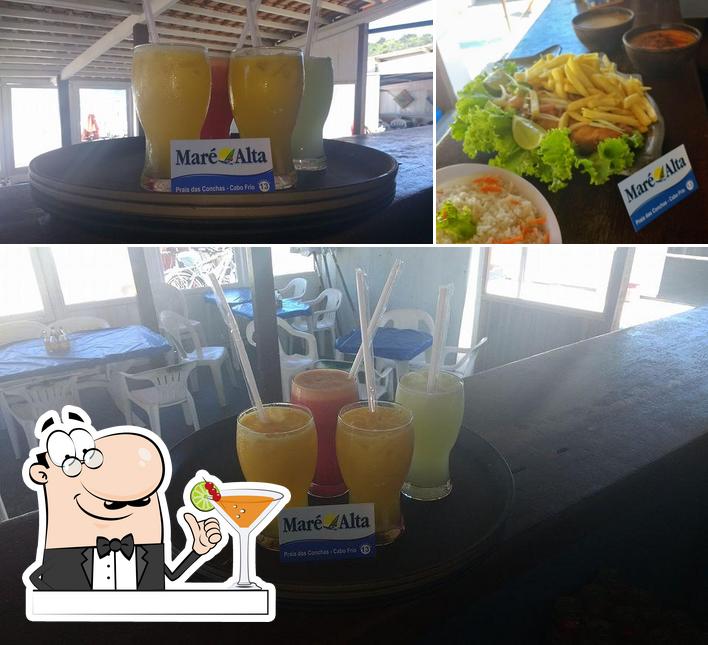 A ilustração do Quiosque Maré Alta, nº 13, Praia das Conchas, Cabo Frio Cabo Frio RJ’s bebida e comida