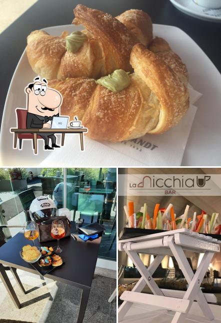 Dai un’occhiata alla immagine che mostra la interni e cibo di BAR LA NICCHIA