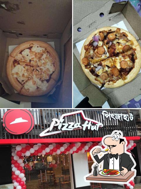 The image of food and interior at Pizza Hut Grand Trunk Rd Liluah, Kolkata
