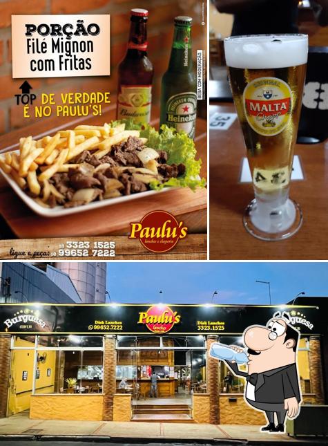A imagem do Paulu's Lanches’s bebida e interior
