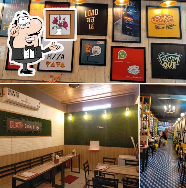 Take a seat at one of the tables at Red Spring Pizza