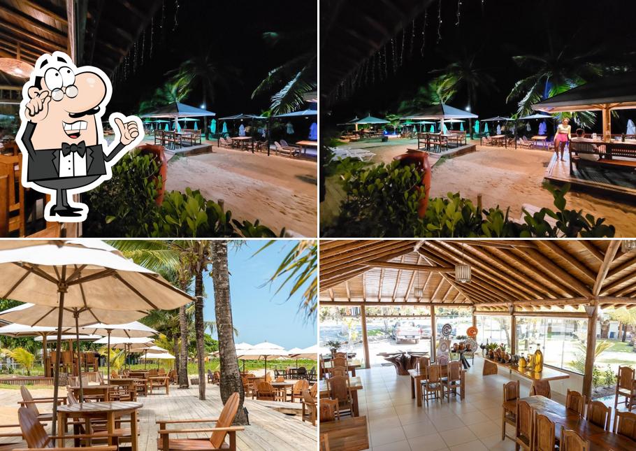 Sente em uma das mesas no Colher de Pau - Lounge Restaurante