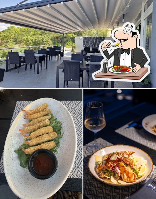 Restaurant Roccia si caratterizza per la cibo e interni