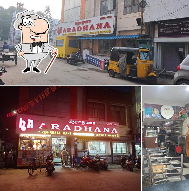 Check out the photo displaying exterior and interior at Aradhana veg restaurant