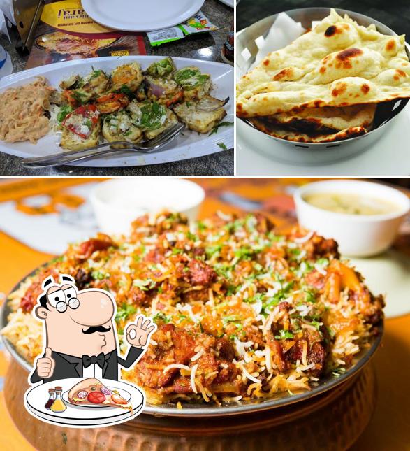 Try out pizza at Biryani Maharaj