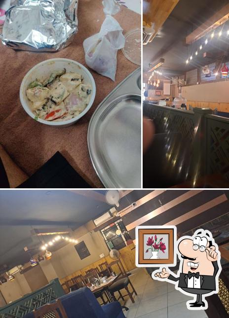 Take a seat at one of the tables at The Punjabi Rasoi