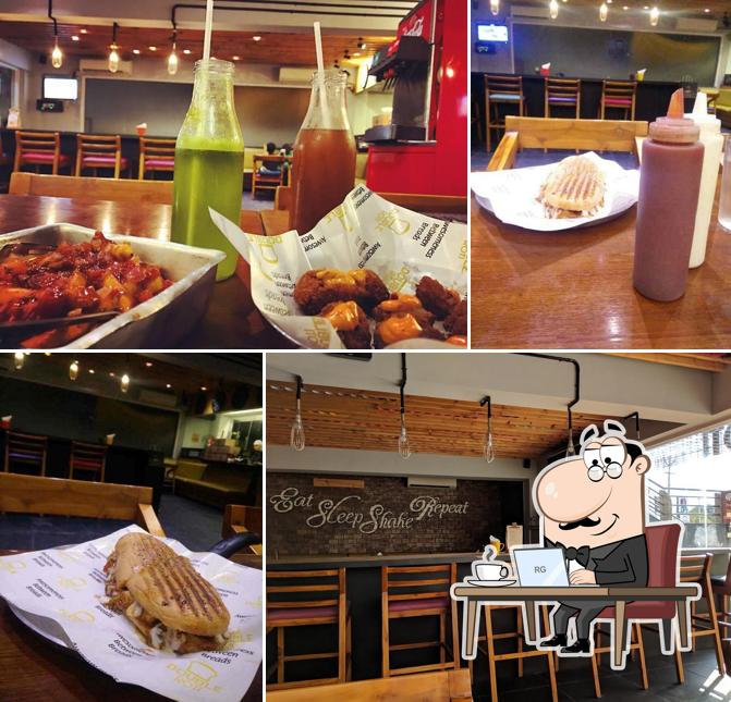 Take a seat at one of the tables at Double Roti