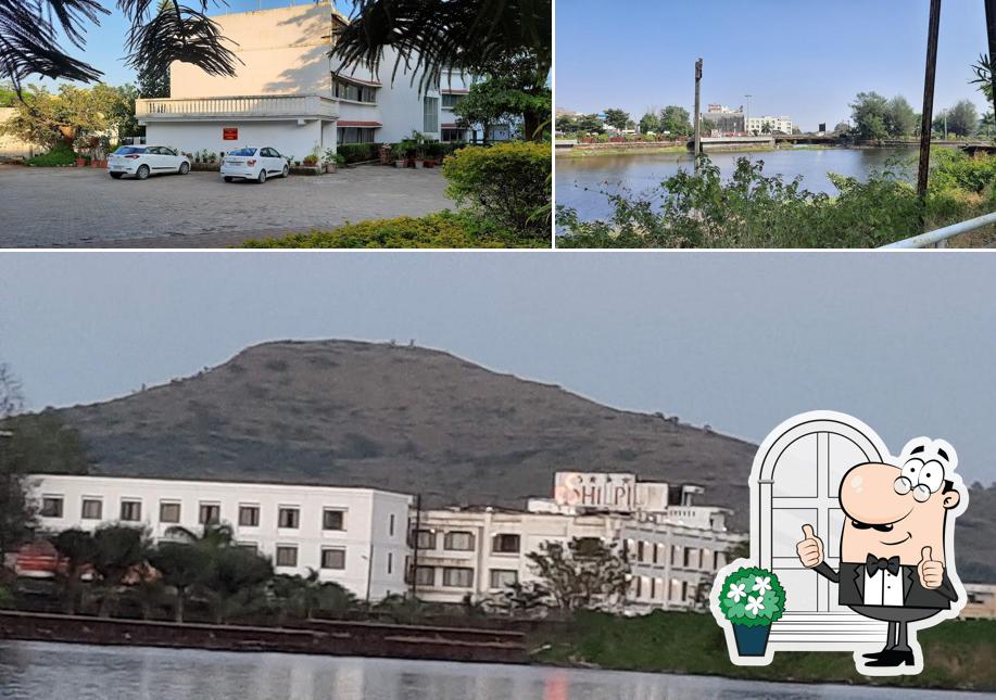 Enjoy the view outside Shilpi Hill Resort - Restaurant Hotel Swimming Pool Lake View Room Suites