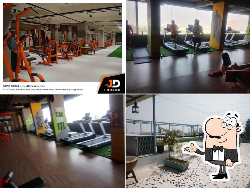 Take a seat at one of the tables at JD Fitness Club Health Center and Health Cafe