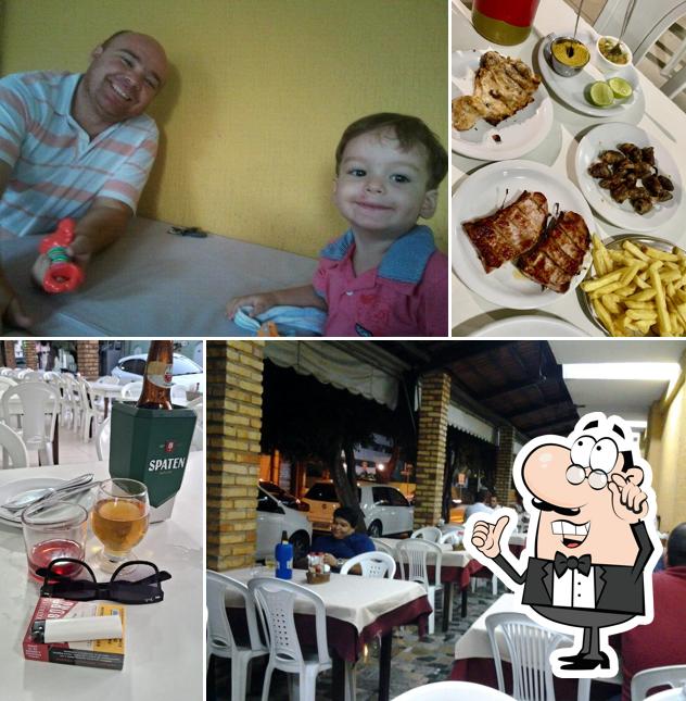 Sente em uma das mesas no Churrascaria Sabor da Picanha