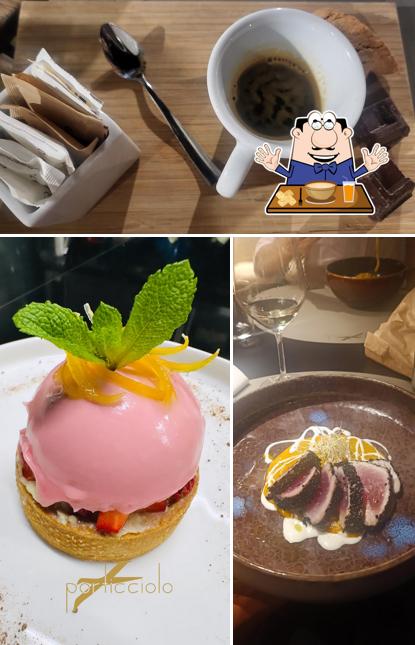 Questa è la foto che presenta la cibo e interni di PORTICCIOLO