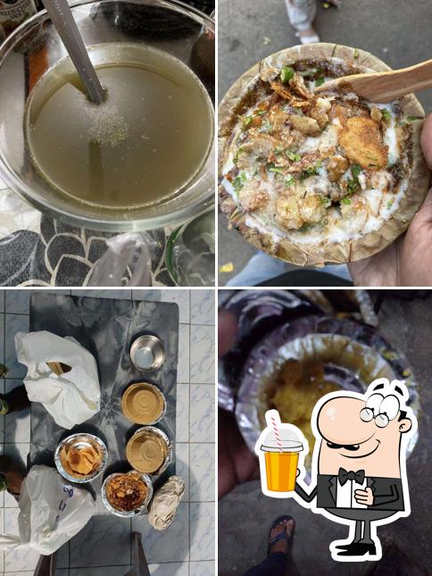 Enjoy a drink at Shukla Chaat House Cart