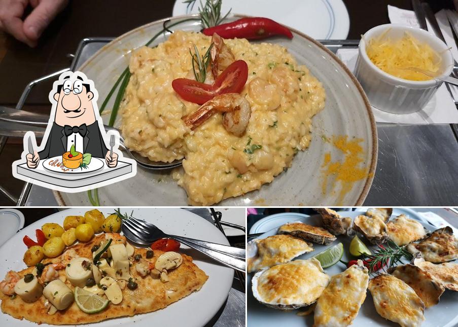 Platos en Restaurante Divino Camarões