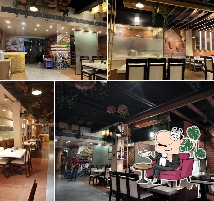 Take a seat at one of the tables at Rasoi by Ruchi