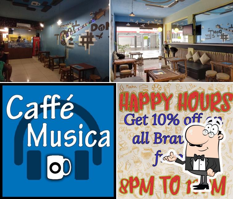 Take a seat at one of the tables at Caffe Musica