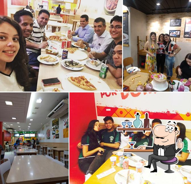 O interior do Domino's Pizza - Nazaré